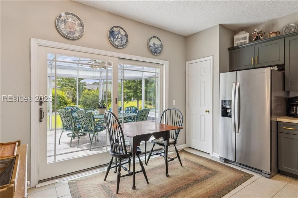 150 Lazy Daisy Drive Bluffton, SC 29909 - Photo 10 of 25 Kitchen eating area to atrium