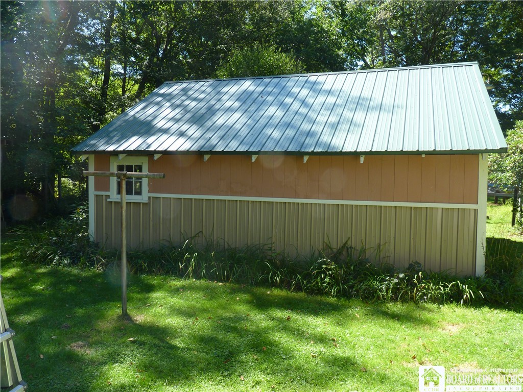 3409 Busti-Stillwater Road Busti, NY 14701 - Photo 40 of 49 Side of garage with metal roof