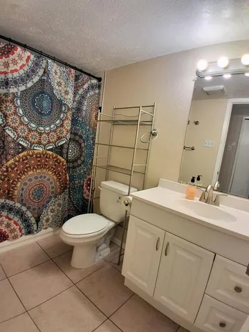 a view of backyard with green space