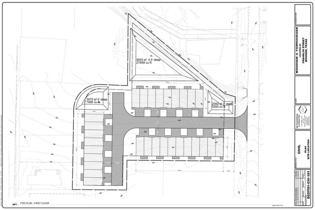 a black and white photo of a living room