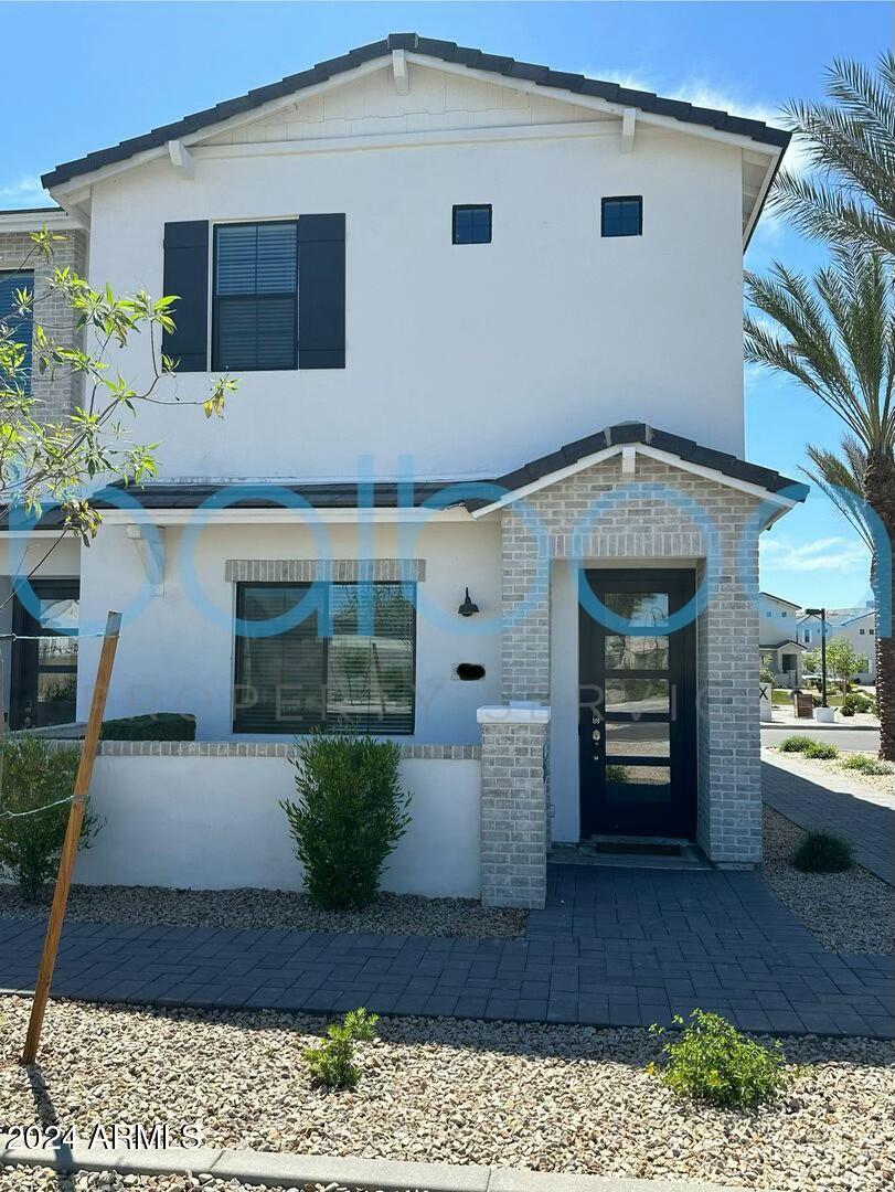 9411 East Cadence Parkway, Unit 1135 Mesa, AZ 85212 - Photo 1 of 52 a front view of a house