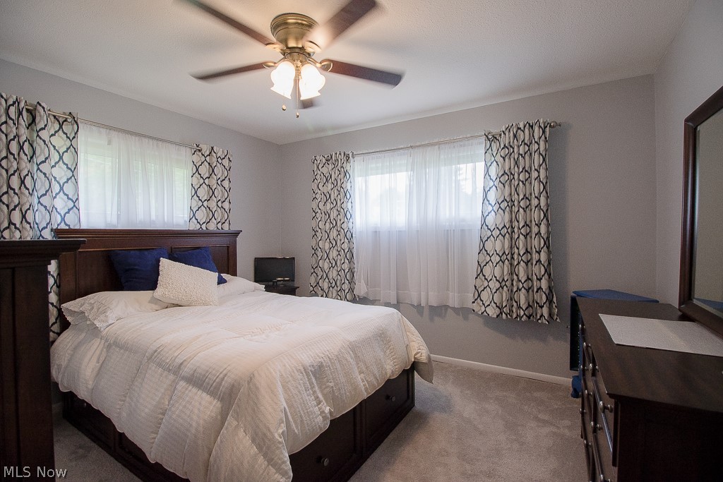 30425 Vineyard Road Willowick, OH 44095 - Photo 9 of 22 Bedroom 1 is located at the front right corner of the home, recently updated with new carpet, paint, and window treatments!