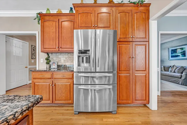 a view of a chairs on wooden deck