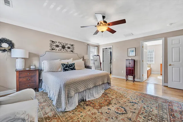 a bathroom with a toilet and shower