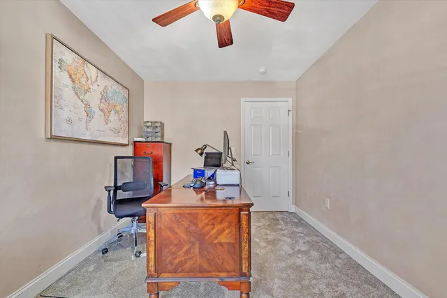 a room with furniture pool table and couch