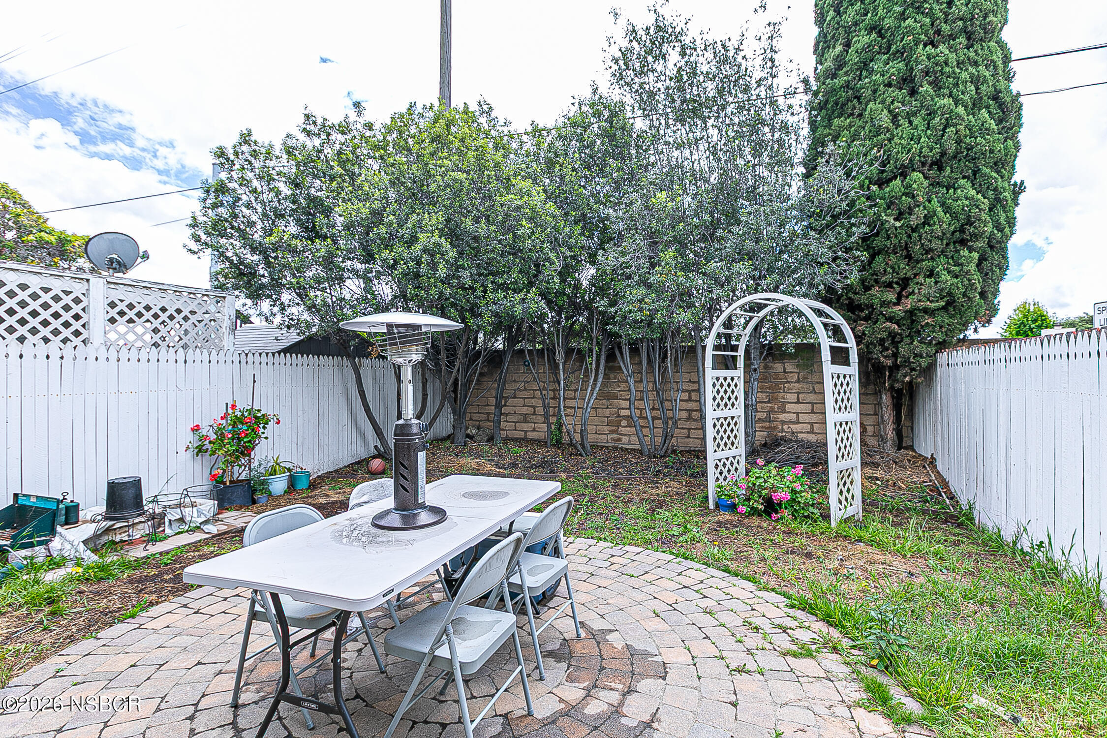 712 Pebble Beach Place Santa Maria, CA 93454 - Photo 28 of 31 a view of a house with backyard and sitting area
