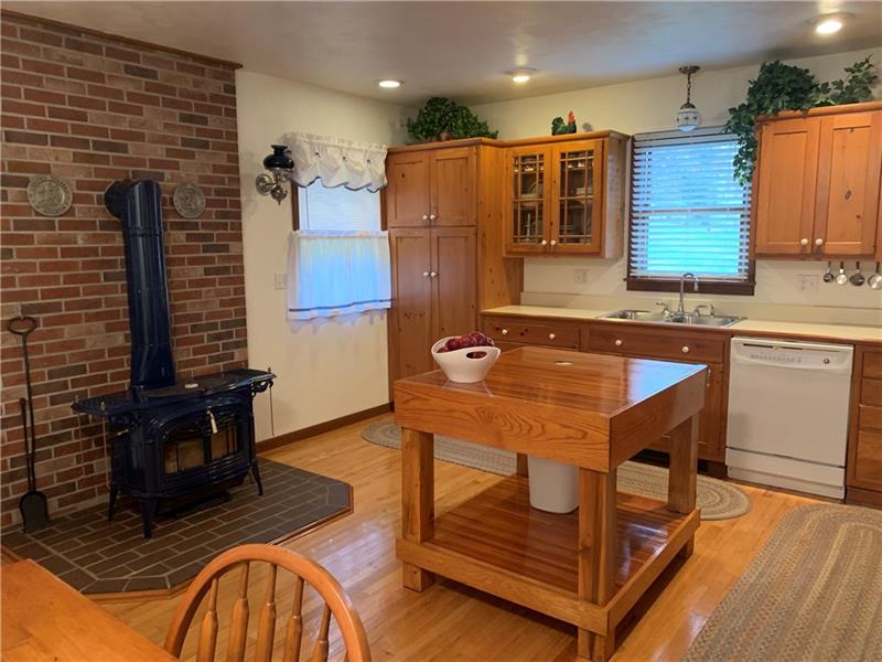 604 Browntown Road New Stanton, PA 15672 - Photo 7 of 22 Kitchen w/wood burning stove