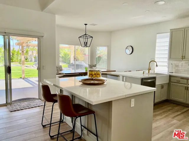 a bedroom with a bed and flat screen tv