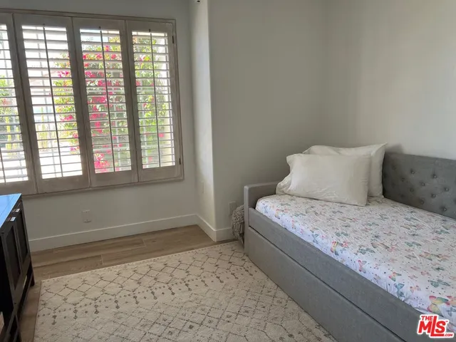 a outdoor space with patio the couches and a dining table with chairs
