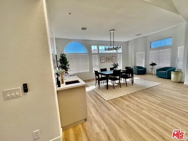 a vase of flowers sitting on a table