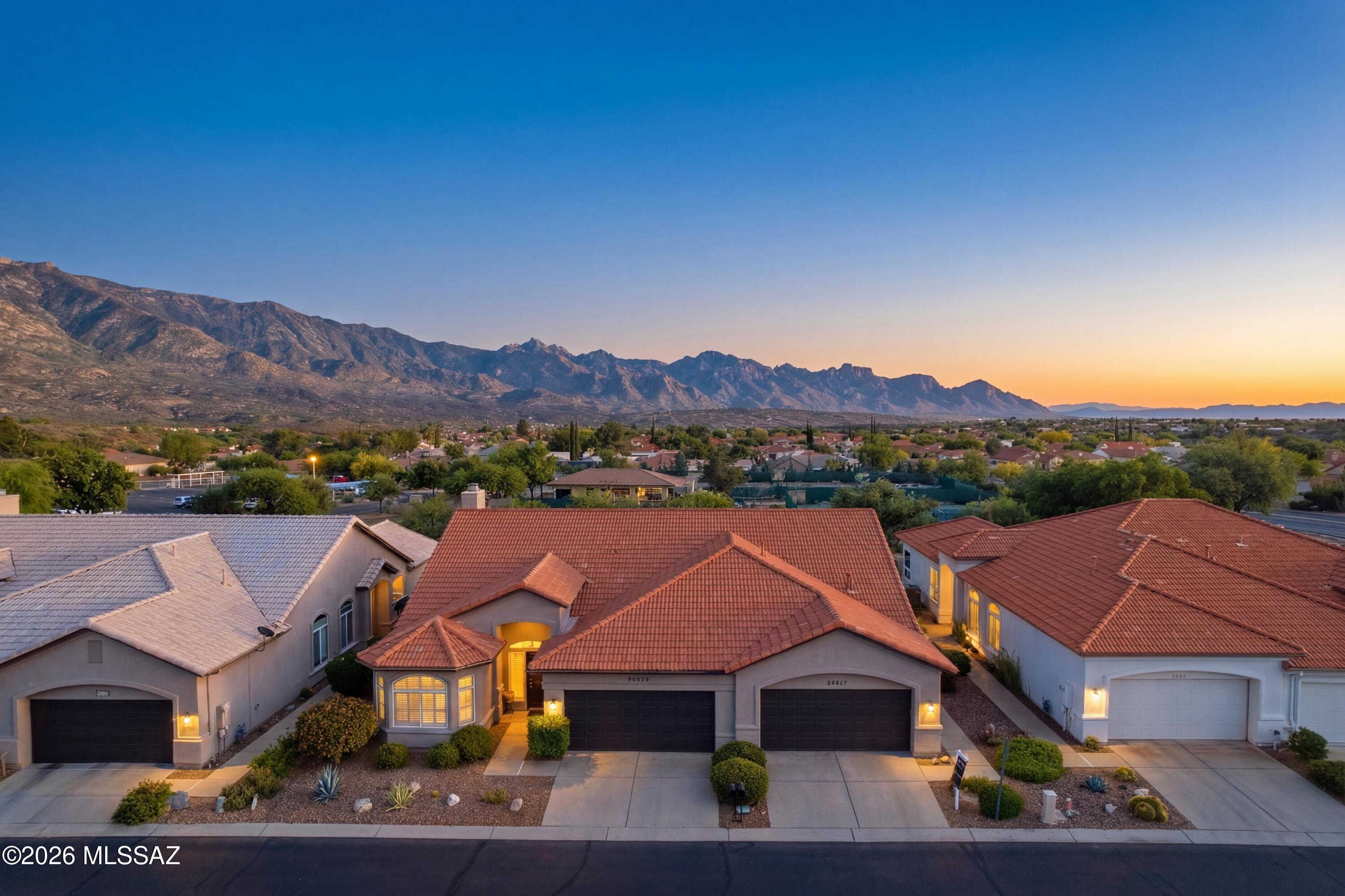64351 East Wind Ridge Circle Tucson, AZ 85739 - Photo 1 of 41 an aerial view of residential houses and trees