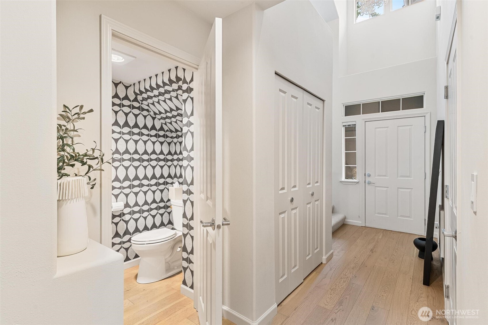 8502 Main Street, Unit E105 Edmonds, WA 98026 - Photo 19 of 39 a bathroom with a shower toilet and sink