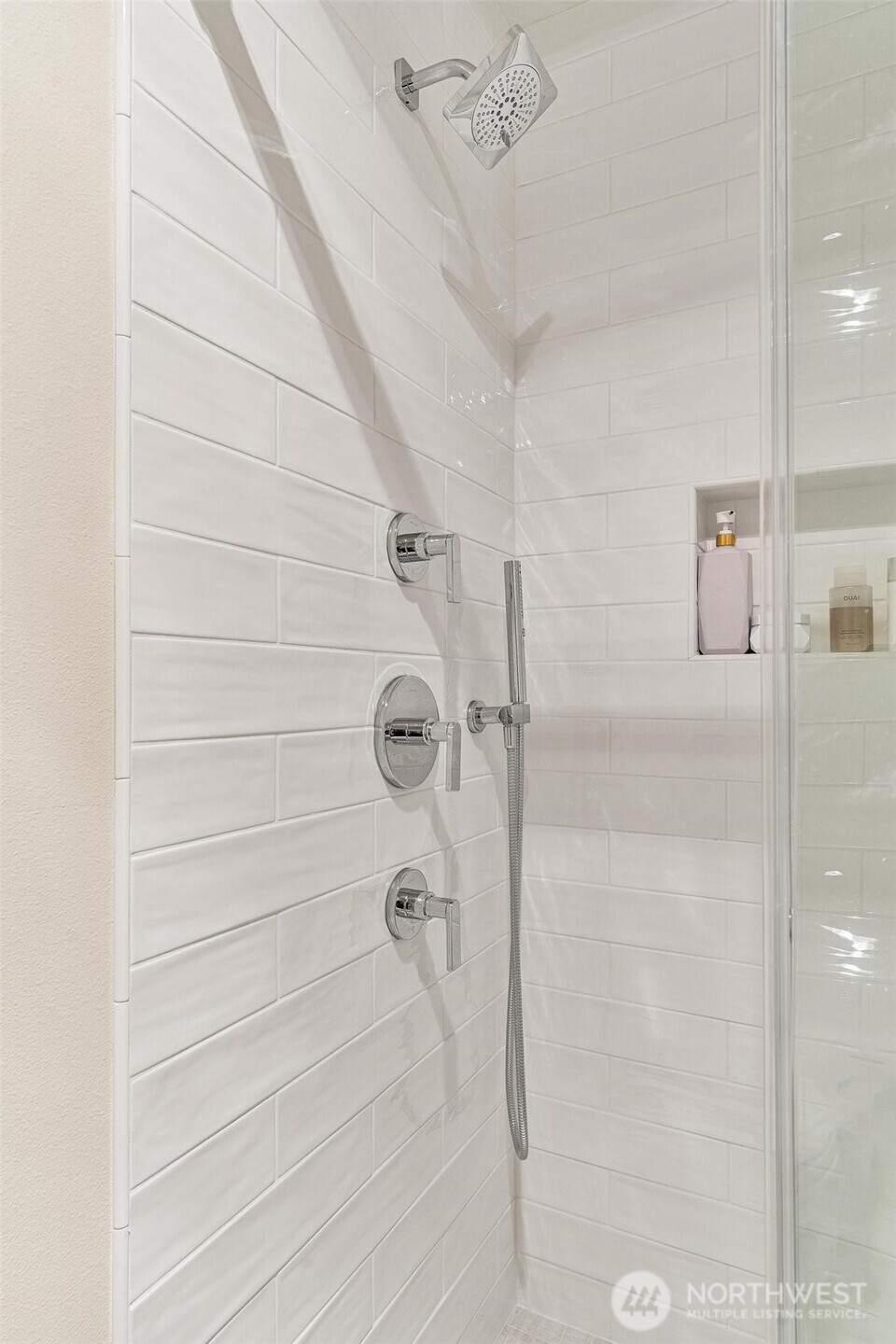 8502 Main Street, Unit E105 Edmonds, WA 98026 - Photo 27 of 39 a bathroom with a shower