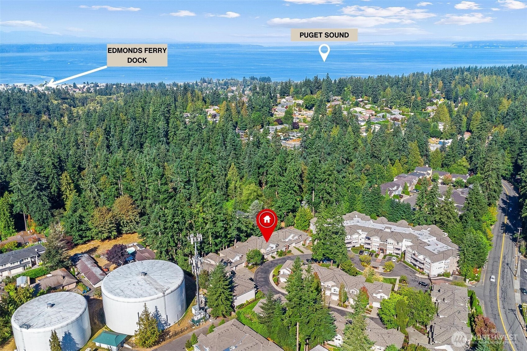 8502 Main Street, Unit E105 Edmonds, WA 98026 - Photo 39 of 39 a view of a city with lush green forest