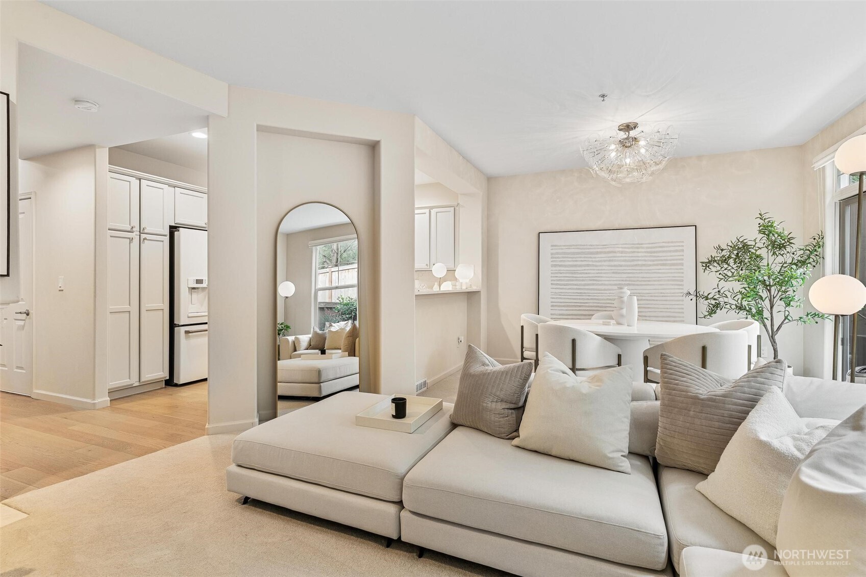 8502 Main Street, Unit E105 Edmonds, WA 98026 - Photo 7 of 39 a living room with furniture and a large window