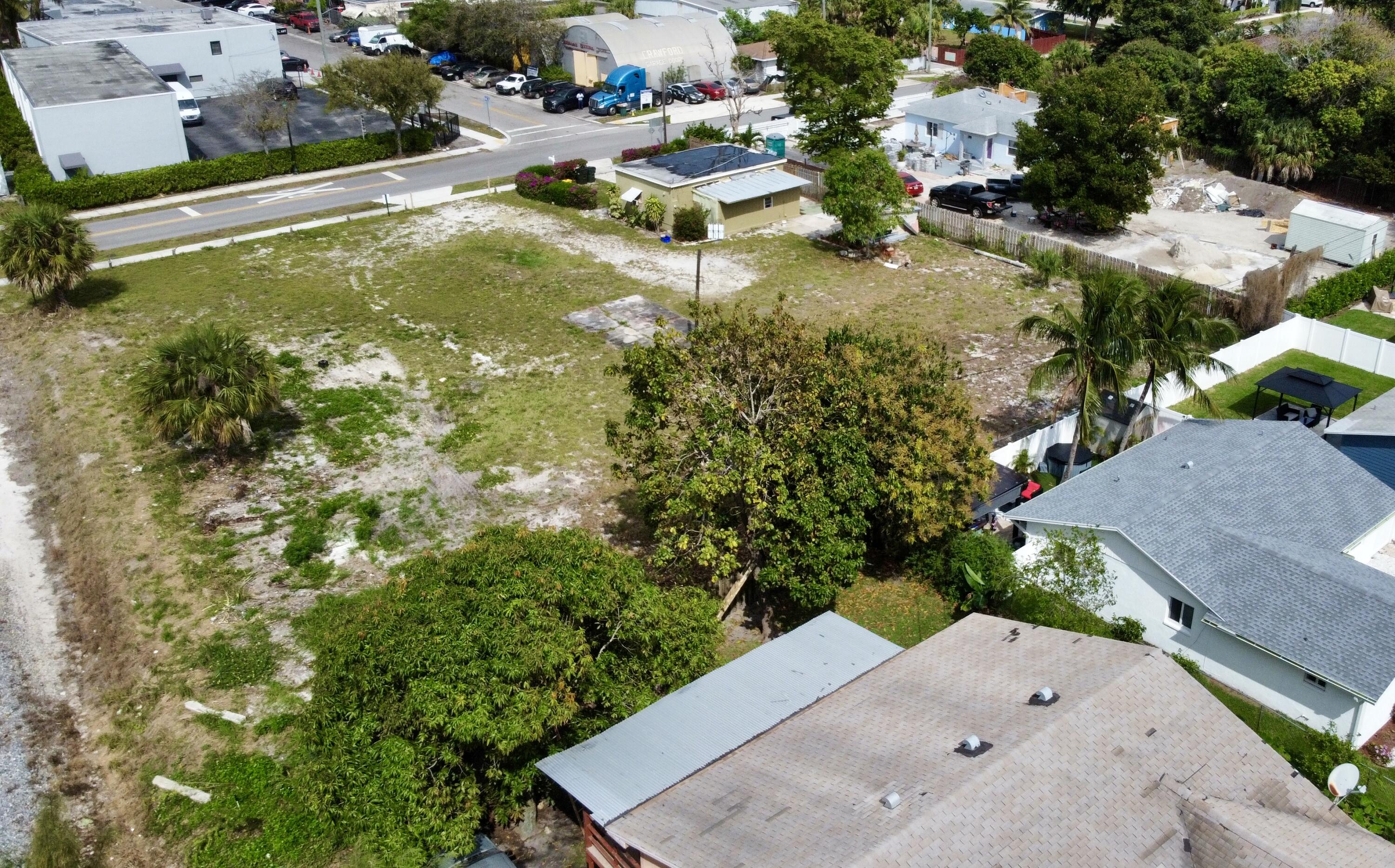 198 Southeast 4th Street Delray Beach, FL 33483 - Photo 6 of 6 an aerial view of residential houses with outdoor space