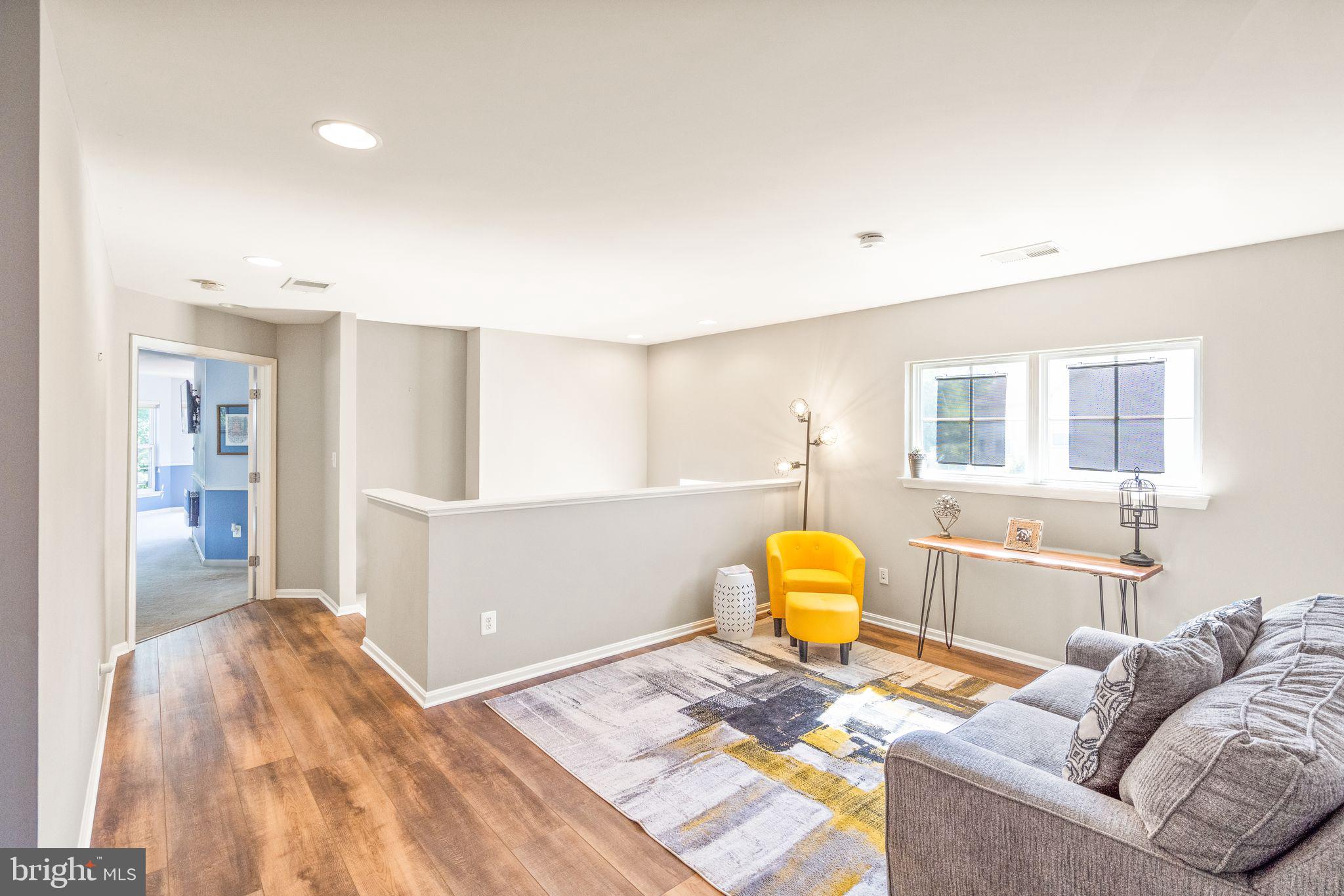 42702 Explorer Drive Brambleton, VA 20148 - Photo 29 of 62 Sitting area upstairs