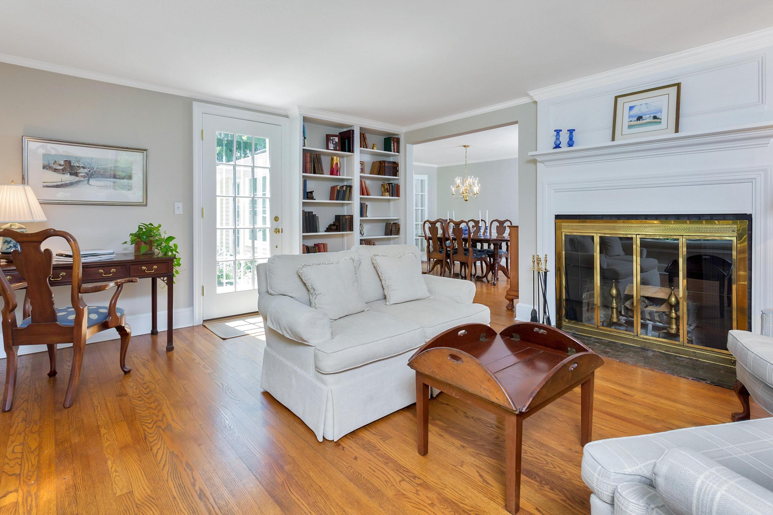 36 St Nicholas Road Darien, CT 06820 - Photo 5 of 26 a living room with furniture and a wooden floor