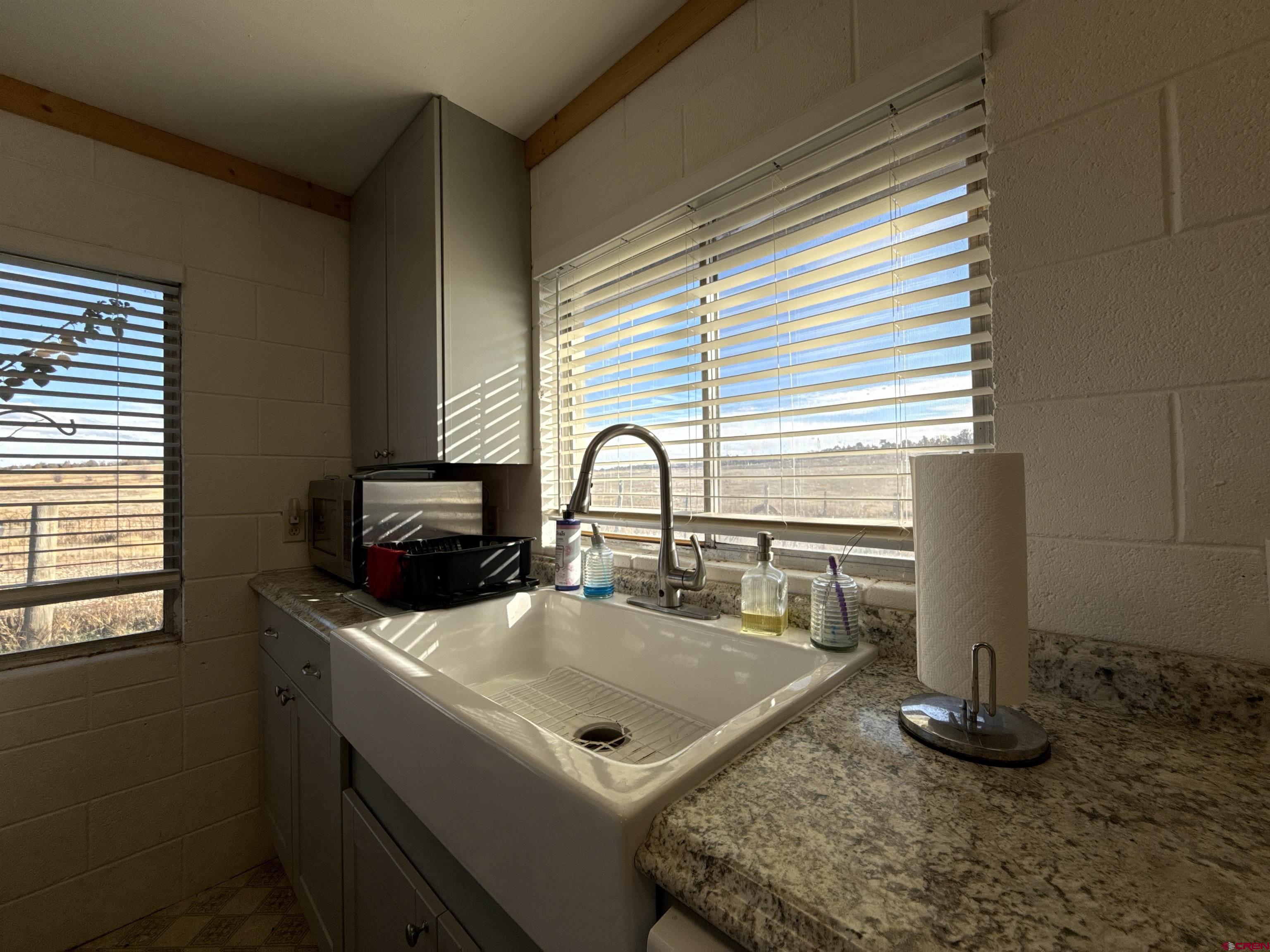 8257 Highway 172 Ignacio, CO 81137 - Photo 12 of 34 a close view of a sink a faucet and a table in a room