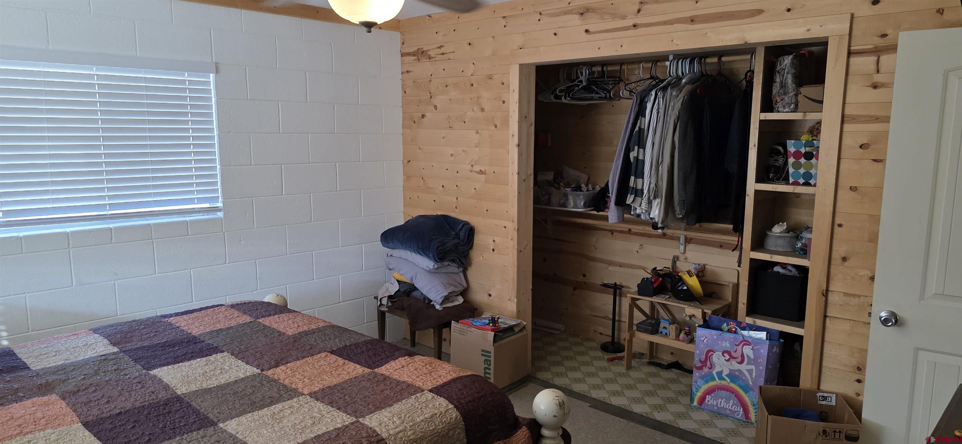8257 Highway 172 Ignacio, CO 81137 - Photo 17 of 34 a view of walk in closet with clothes and shoes