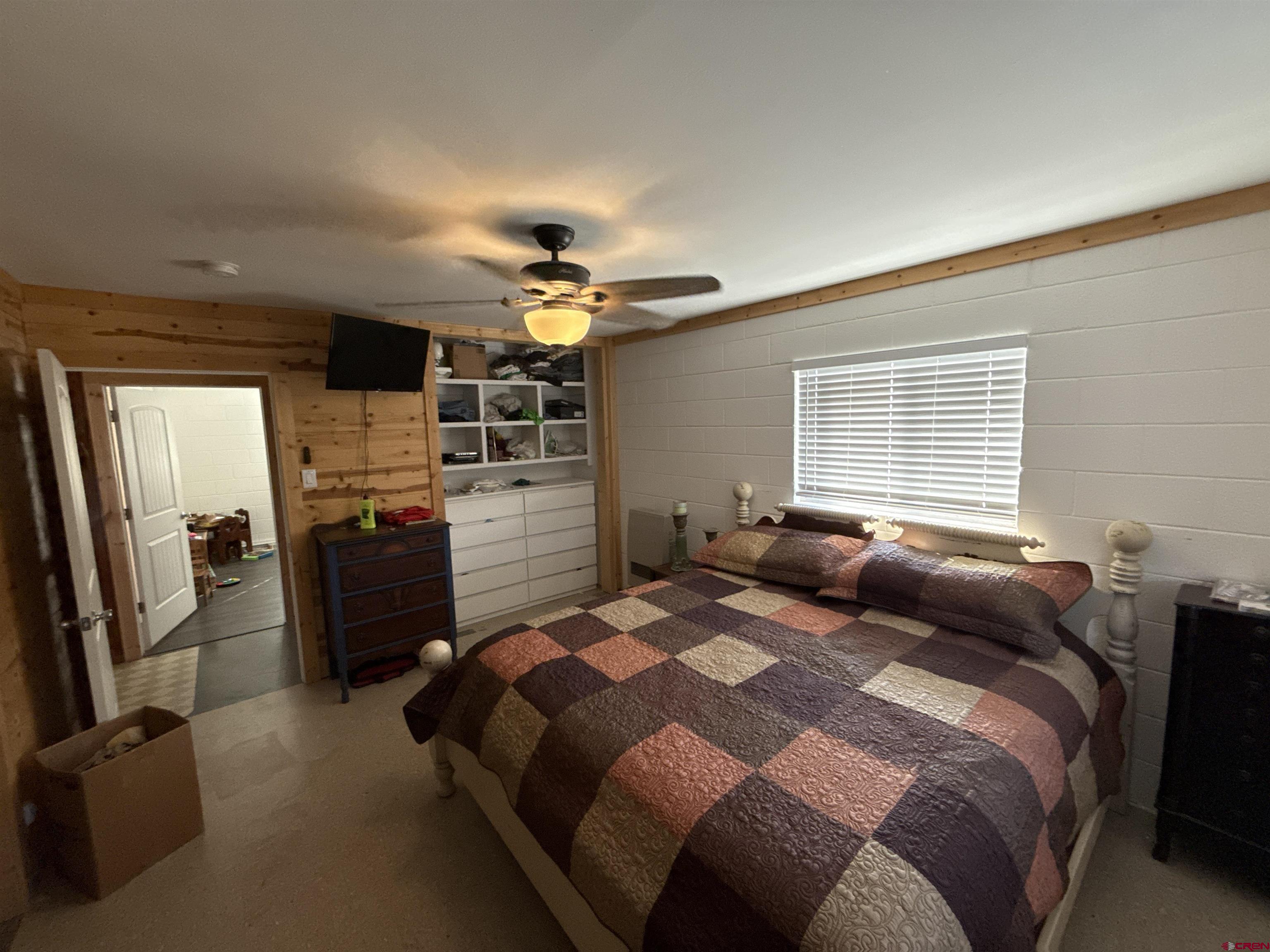 8257 Highway 172 Ignacio, CO 81137 - Photo 18 of 34 a bedroom with a bed and furniture