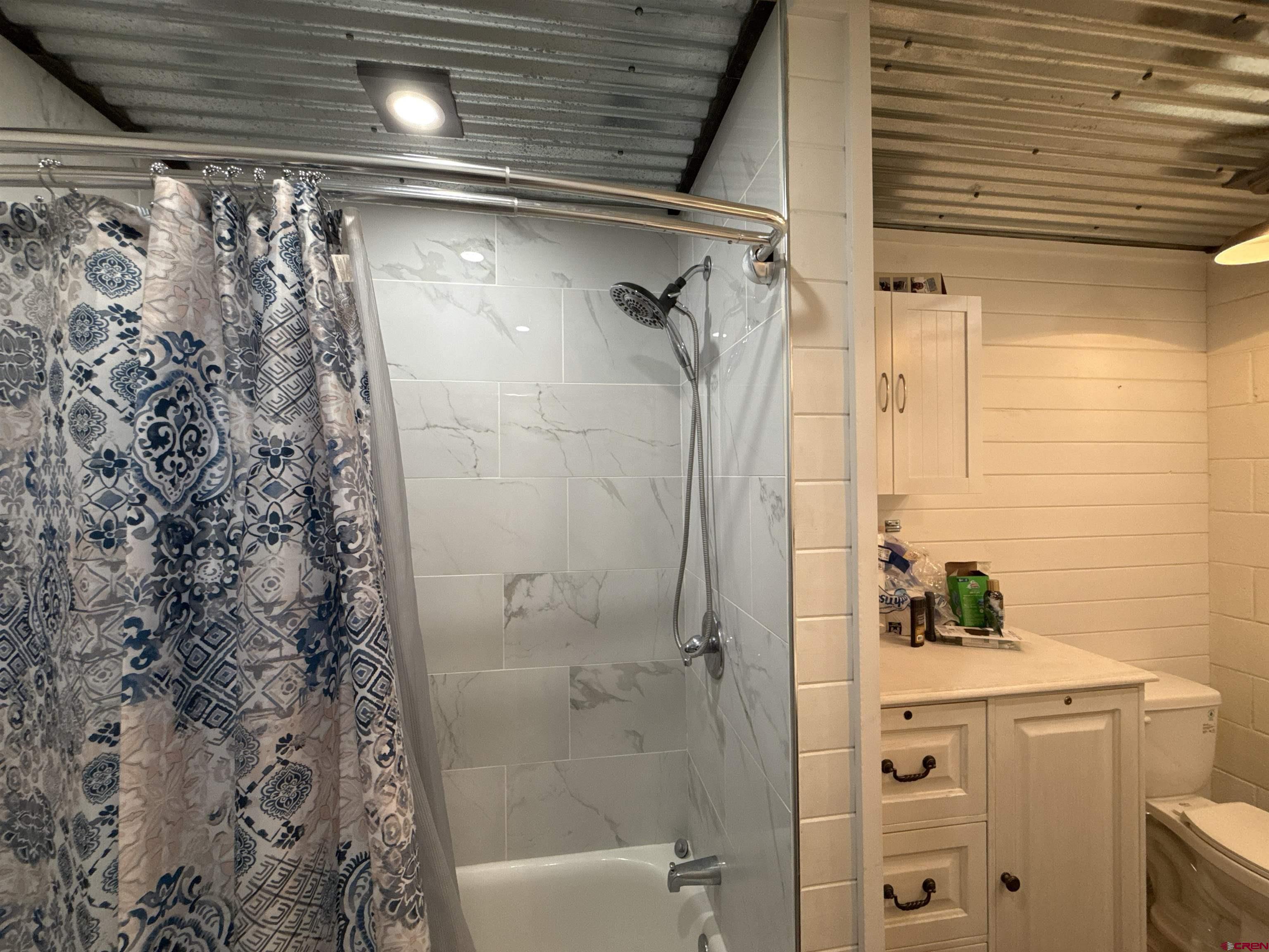 8257 Highway 172 Ignacio, CO 81137 - Photo 21 of 34 a bathroom with a shower and a sink