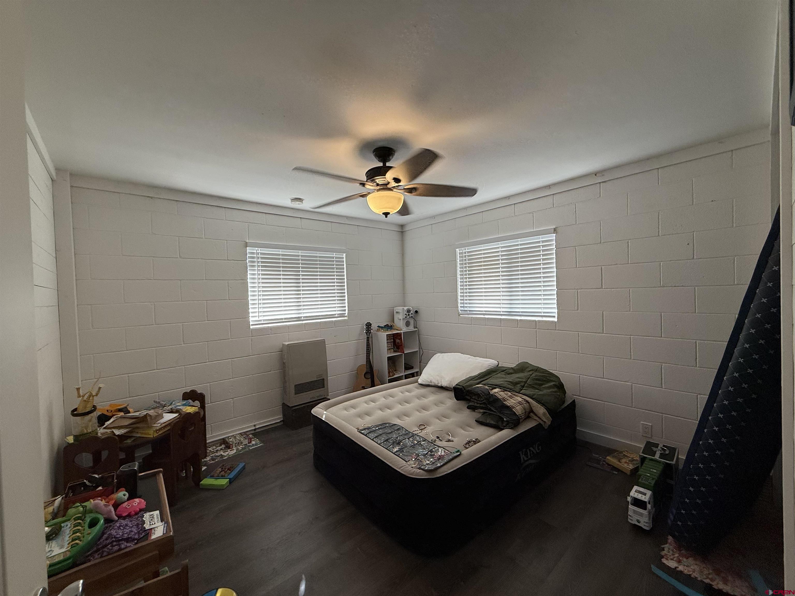 8257 Highway 172 Ignacio, CO 81137 - Photo 23 of 34 a living room with hard wood floor and a window