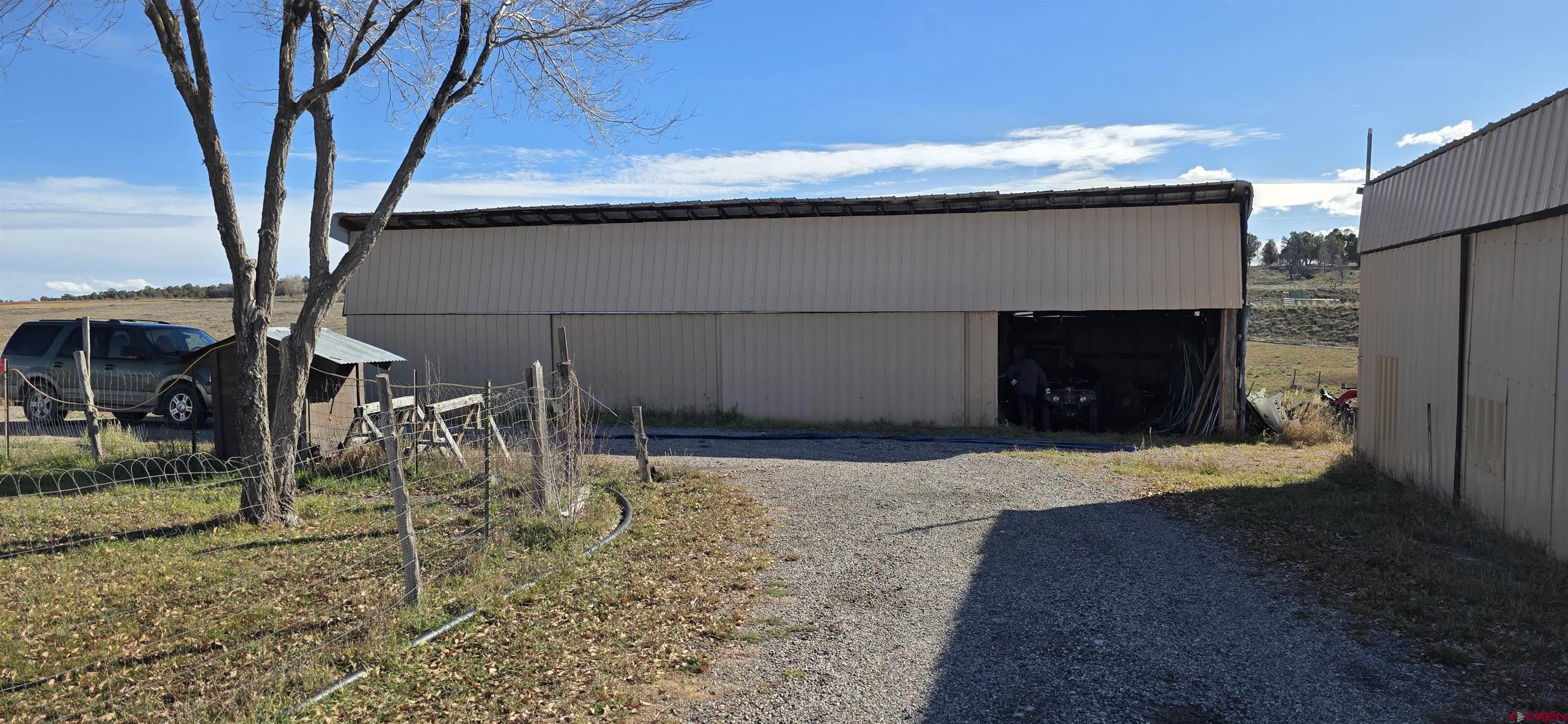 8257 Highway 172 Ignacio, CO 81137 - Photo 29 of 34 a view of a house with backyard
