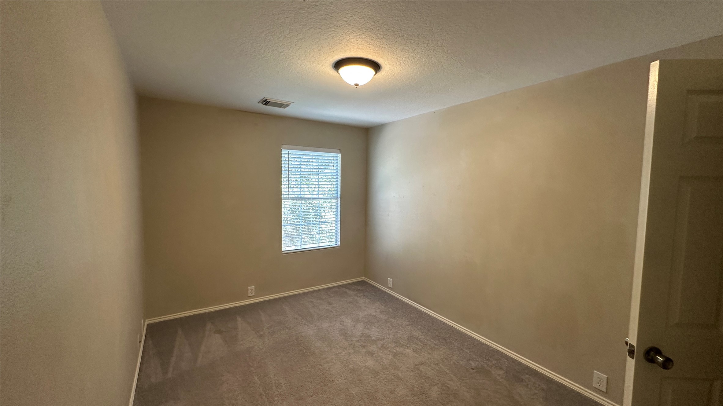 23851 Single Oak Street Spring, TX 77373 - Photo 14 of 15 a view of an empty room with a window