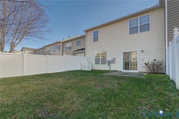 a view of a backyard of the house