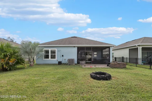 a front view of building with yard