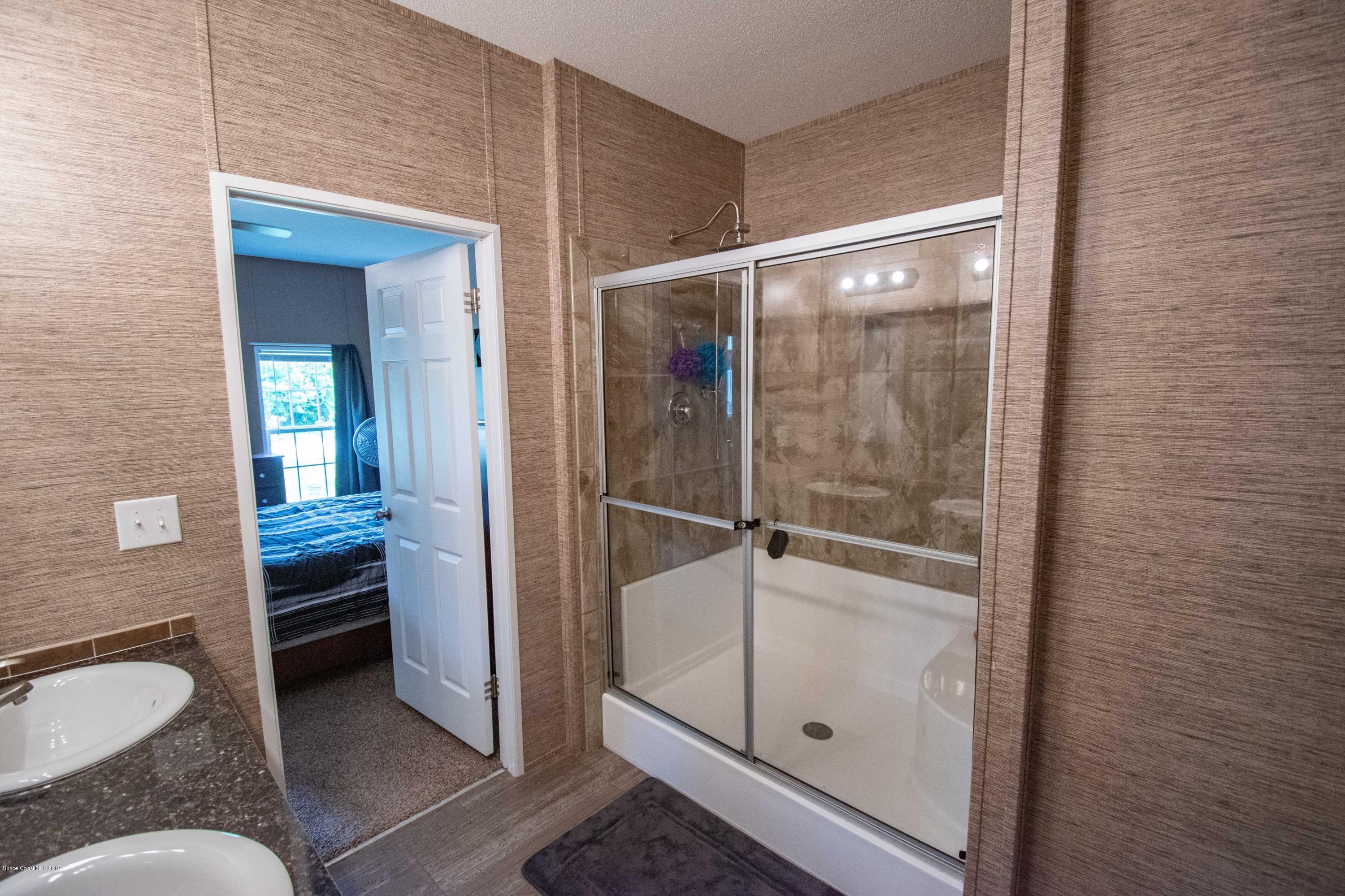 2695 Brockett Road Mims, FL 32754 - Photo 11 of 22 55932449_399898503922749_374152006080030