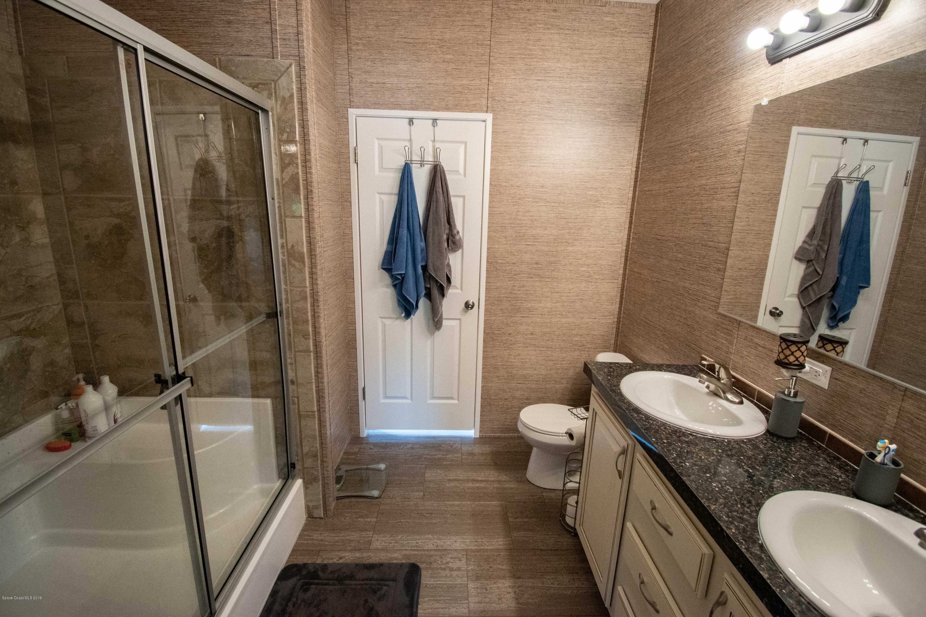 2695 Brockett Road Mims, FL 32754 - Photo 12 of 22 55837880_2255878308006476_13269627491959