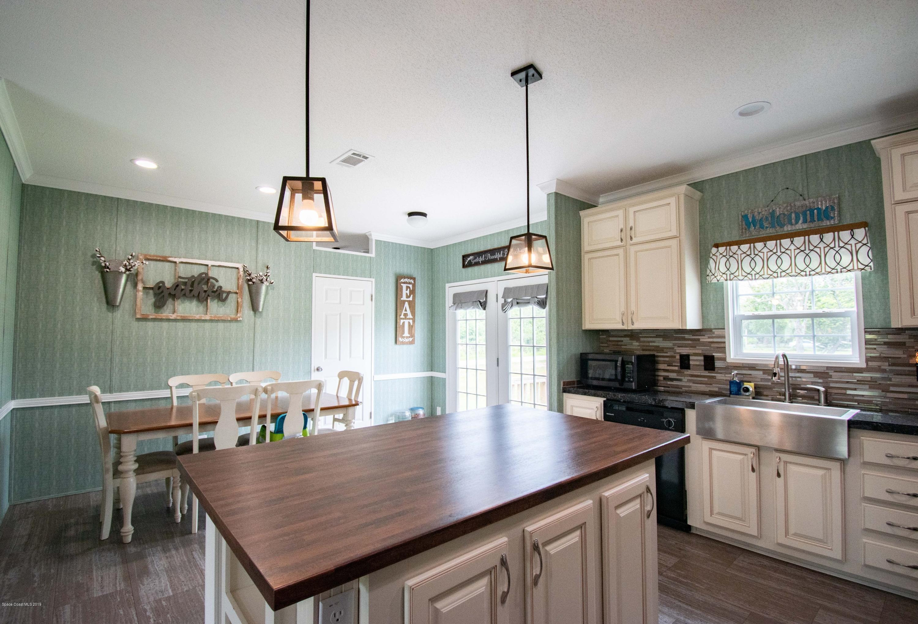 2695 Brockett Road Mims, FL 32754 - Photo 9 of 22 55875092_2001645856600601_74114810787764