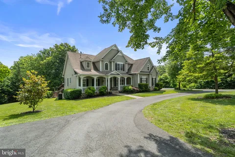 an aerial view of a house with a garden