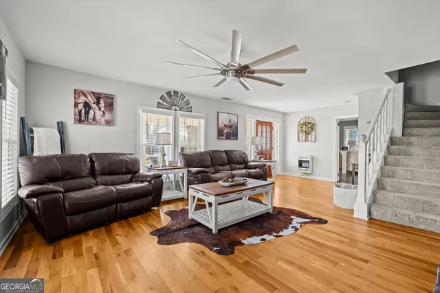 a kitchen with stainless steel appliances granite countertop a stove and cabinets