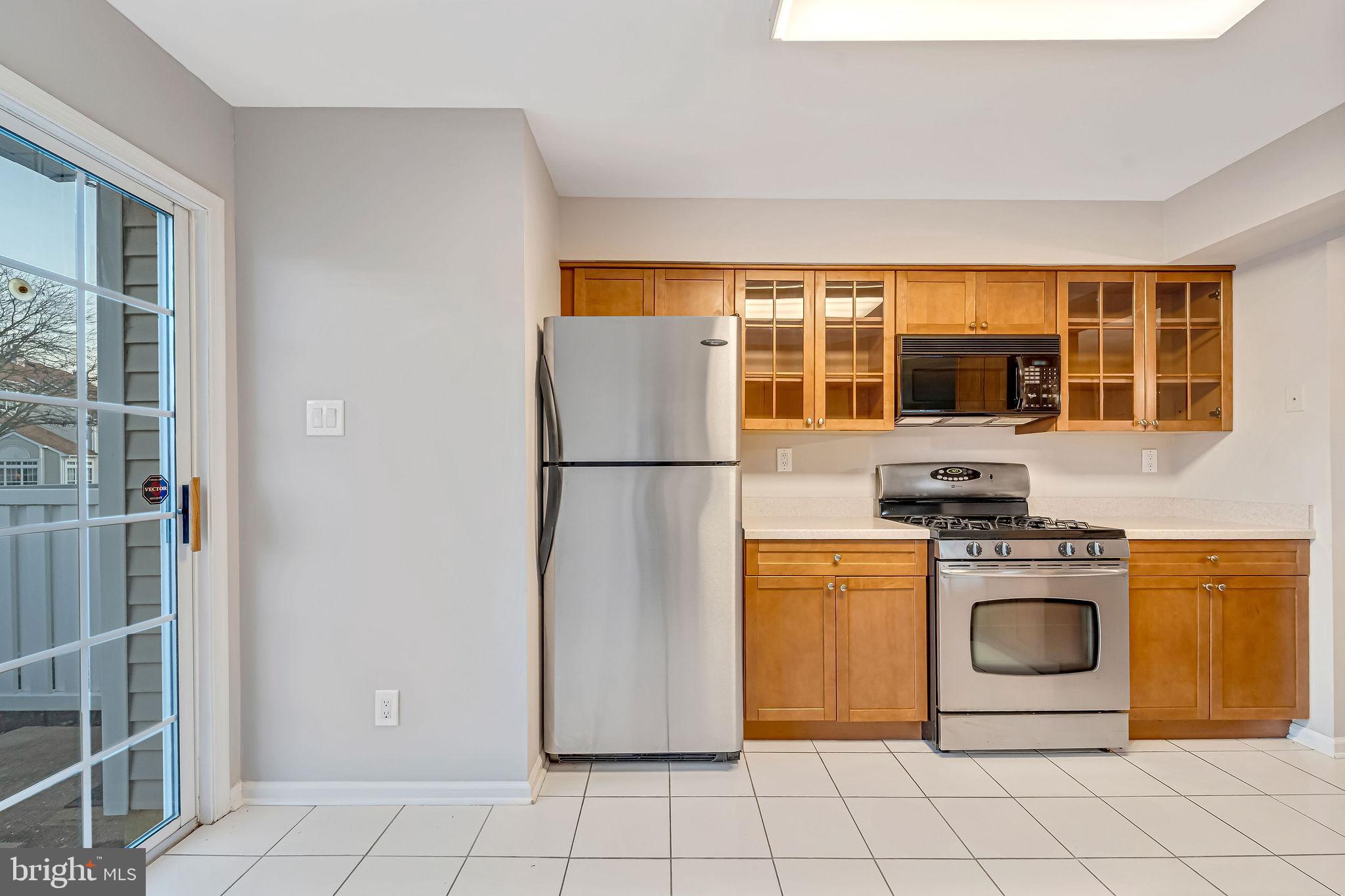 4401 Aberdeen Lane Blackwood, NJ 08012 - Photo 11 of 29 a kitchen with stainless steel appliances granite countertop a refrigerator and a stove