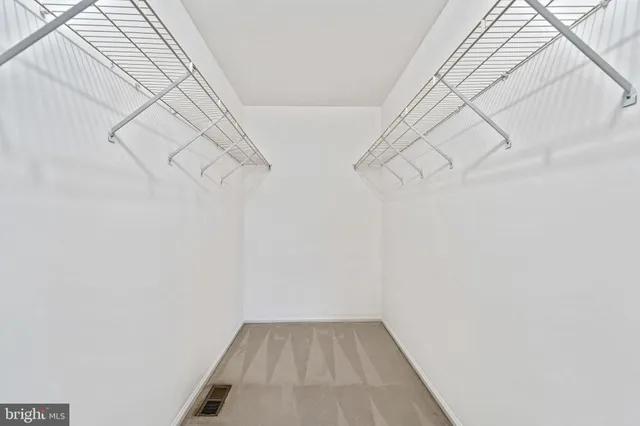 a view of a room with racks on the wall