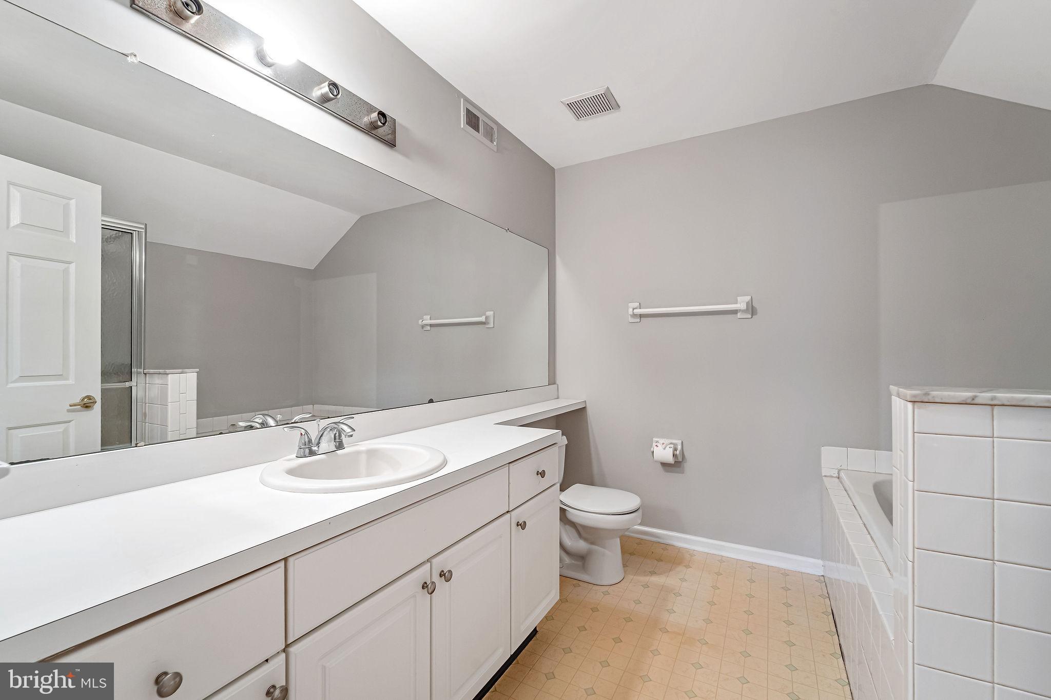 4401 Aberdeen Lane Blackwood, NJ 08012 - Photo 25 of 29 a bathroom with a double vanity sink toilet and a mirror