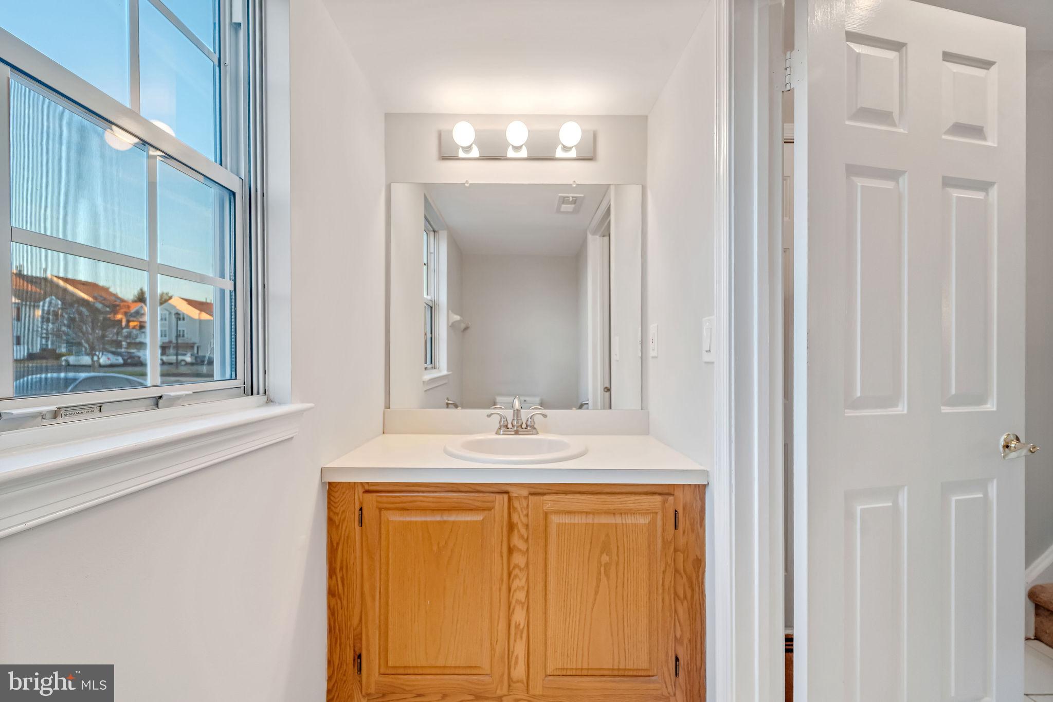 4401 Aberdeen Lane Blackwood, NJ 08012 - Photo 6 of 29 a bathroom with a sink and a mirror