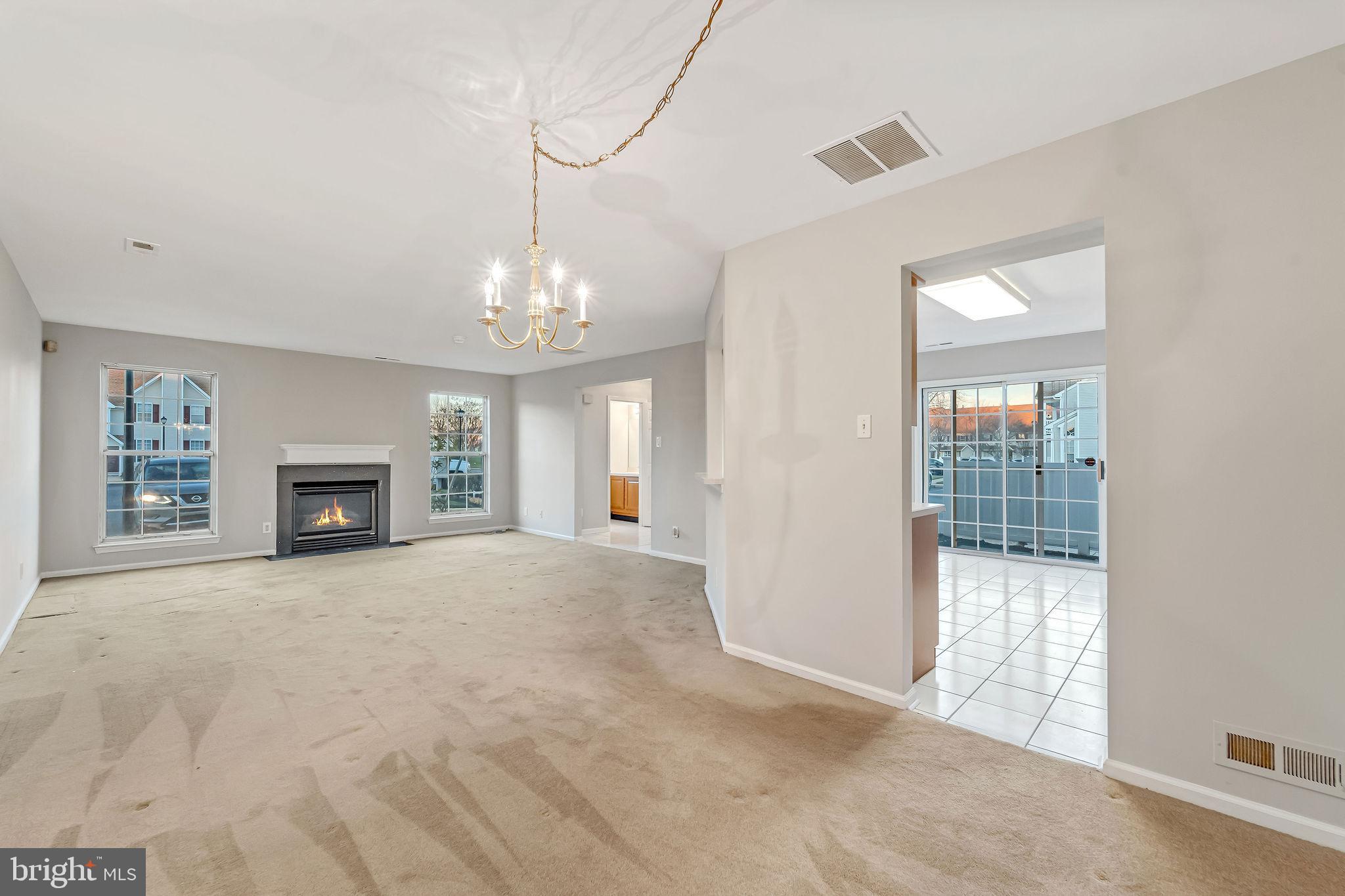 4401 Aberdeen Lane Blackwood, NJ 08012 - Photo 9 of 29 a view of an empty room with a window and fireplace