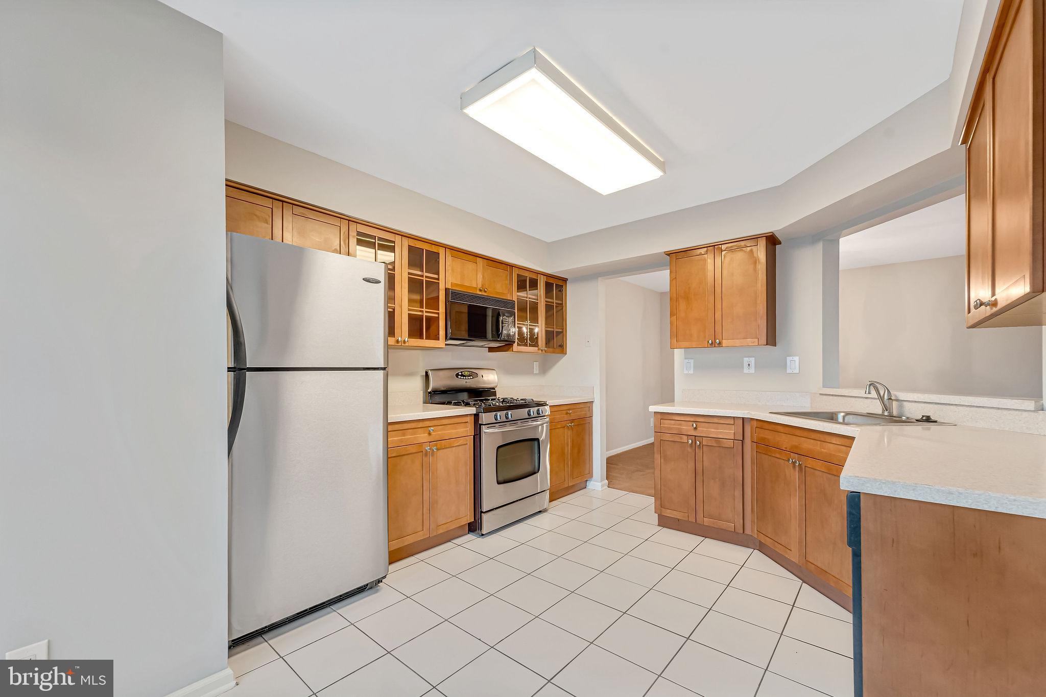 4401 Aberdeen Lane Blackwood, NJ 08012 - Photo 10 of 29 a kitchen with stainless steel appliances granite countertop a refrigerator sink and stove