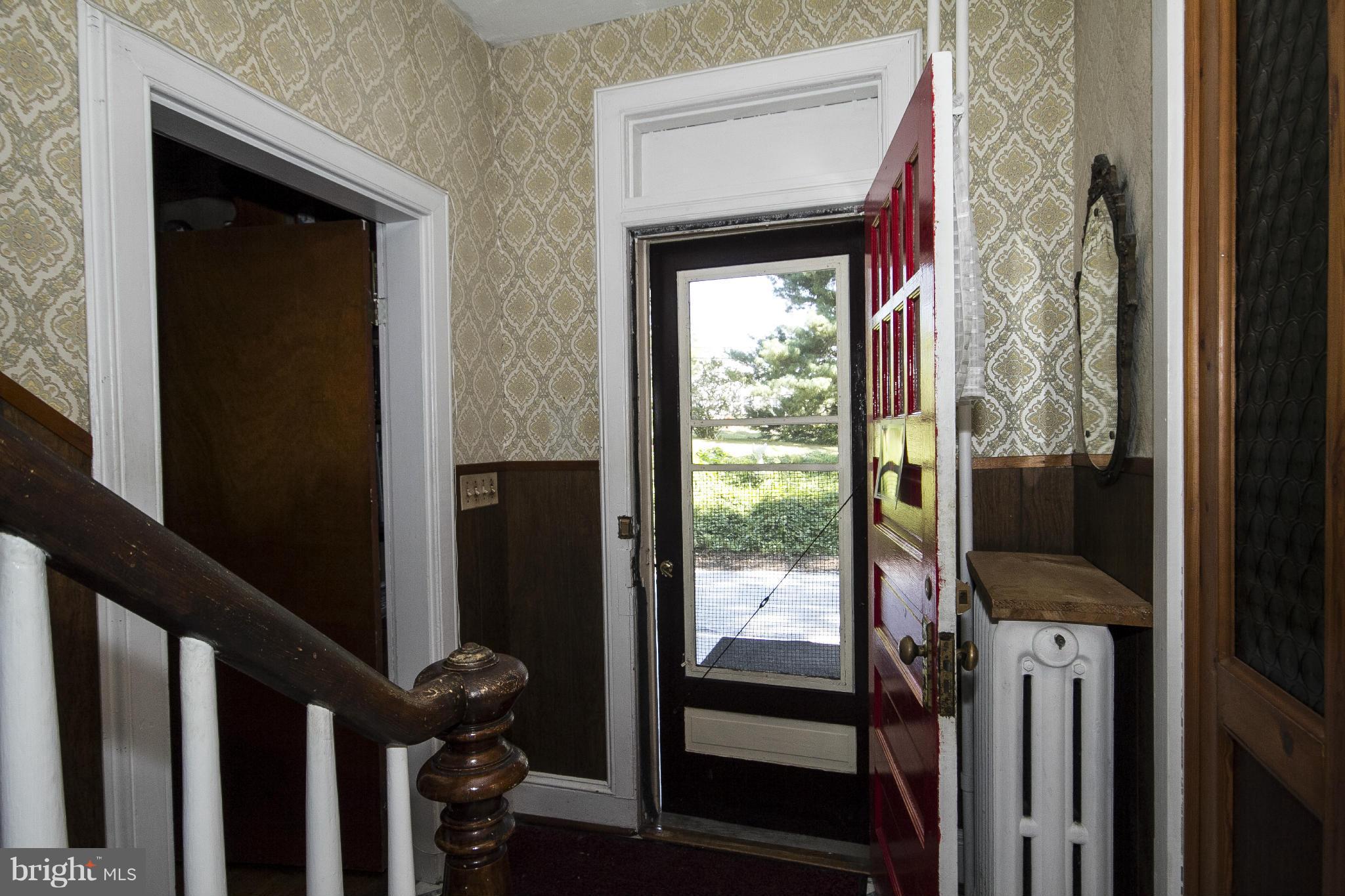 1554 South Rolling Road Baltimore, MD 21227 - Photo 2 of 22 a view of a porch of a house