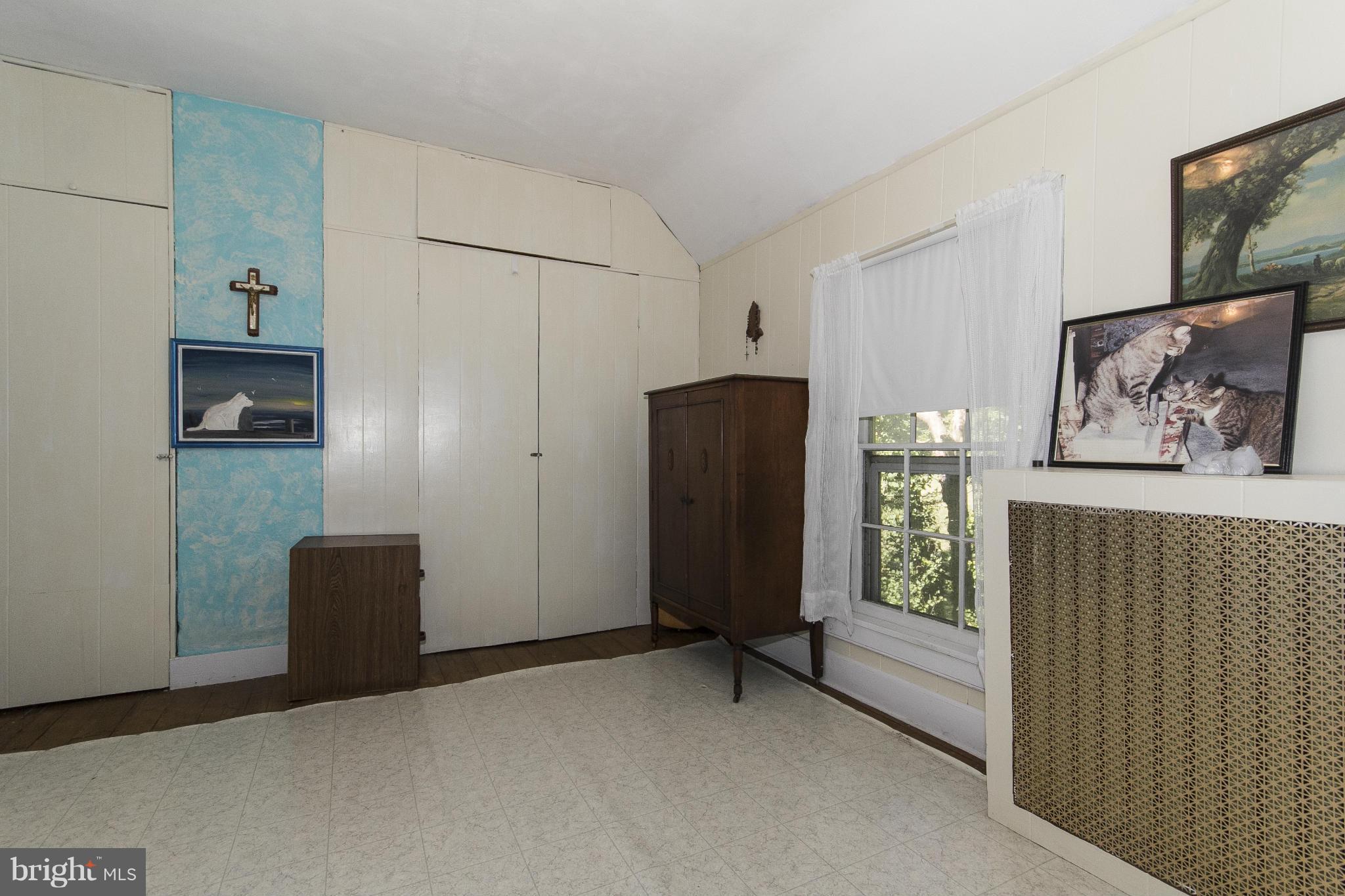 1554 South Rolling Road Baltimore, MD 21227 - Photo 14 of 22 a view of livingroom with furniture and window