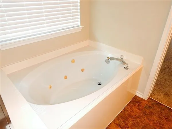 a bathroom with a bathtub