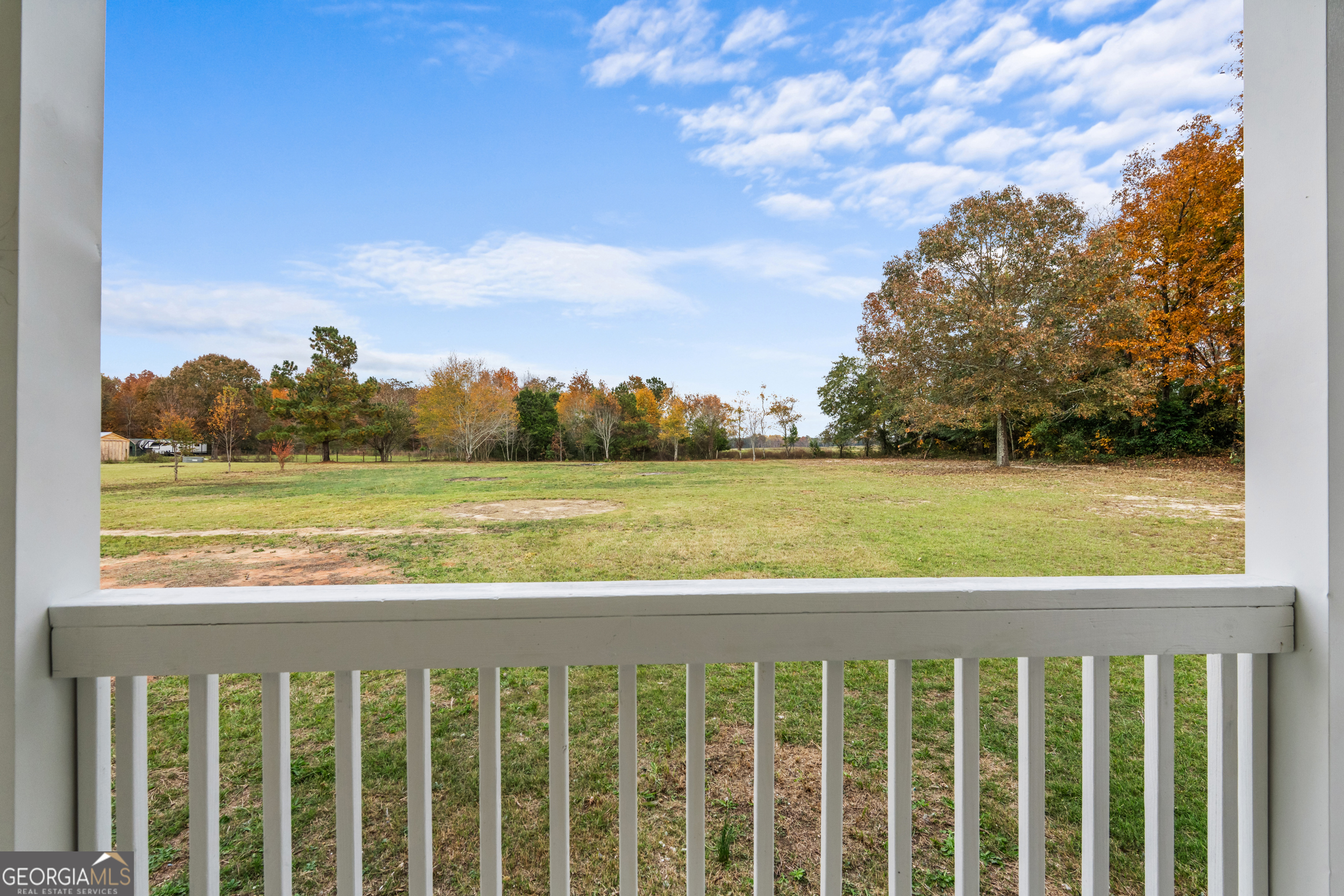 10132 Clarks Mill Road Avera, GA 30803 - Photo 23 of 28 This is your back porch....looks like a painting. Imagine dining alfresco or sipping a cup of coffee. WHOO WEE!