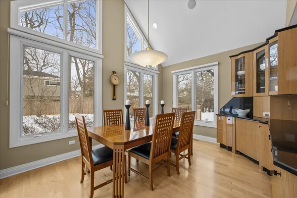 a dining room with furniture and window