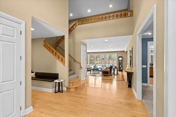 a view of dining room with furniture and wooden floor