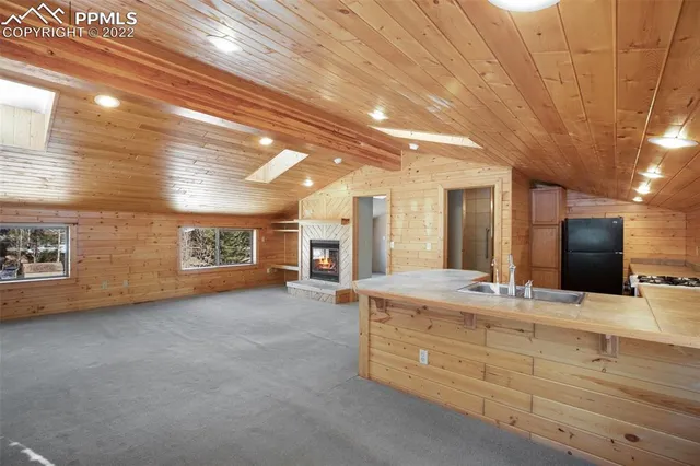 a bathroom with a sink and a large mirror