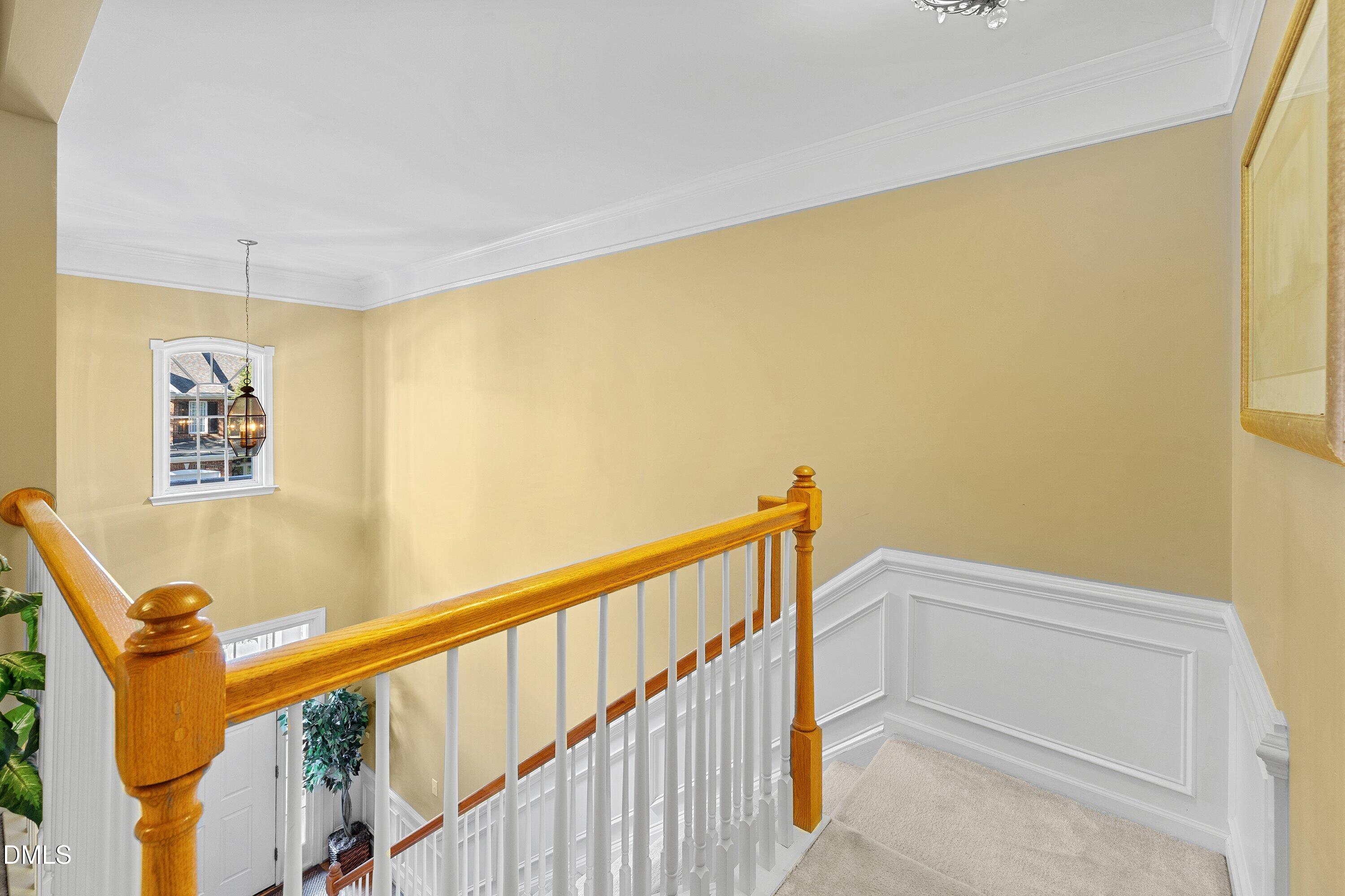 3613 Lion Ridge Court Raleigh, NC 27612 - Photo 23 of 40 a view of a room with wooden walls